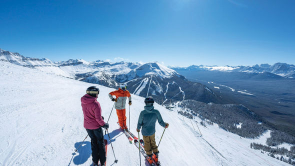 Skiers at Lake Louise Ski Resort in Banff National Park.